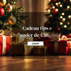 Kerstcadeaus onder kerstboom met gouden en rode ballen, cadeau tips onder de €50