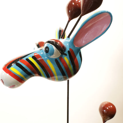 Beeld 'Crazy Giraffe' van Mia Coppola
