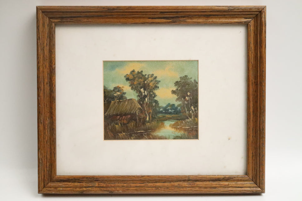 Poster achter glas 'Huisje bij meer'